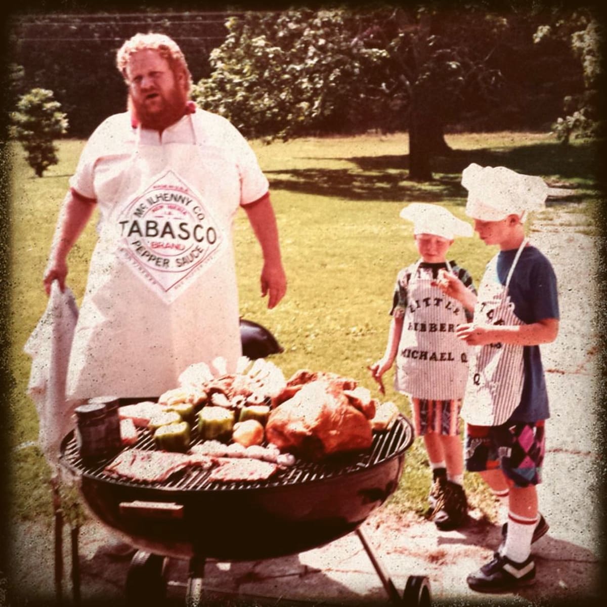 Jim Quessenberry grilling with his family in Birdeye, Arkansas.